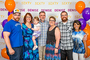 Denise and her extended family celebrate her sixtieth birthday.   Photo by Jeffrey Meyer.
