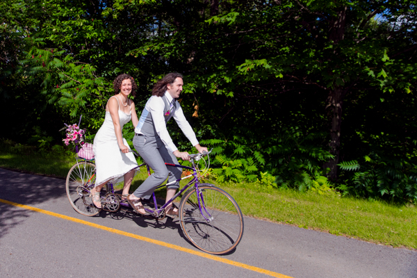 Bride and groom on a tandum bike