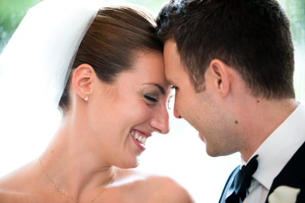 husband and wife touch forehead to forehead